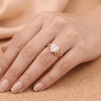 Heart cut Celtic moissanite ring on hand model