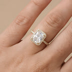 Moissanite engagement ring on model's hand