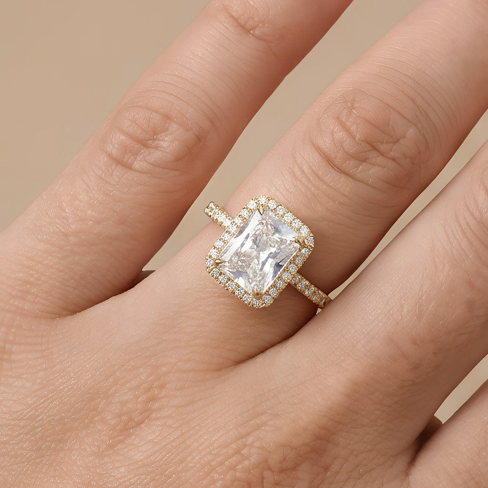 Moissanite engagement ring on model's hand