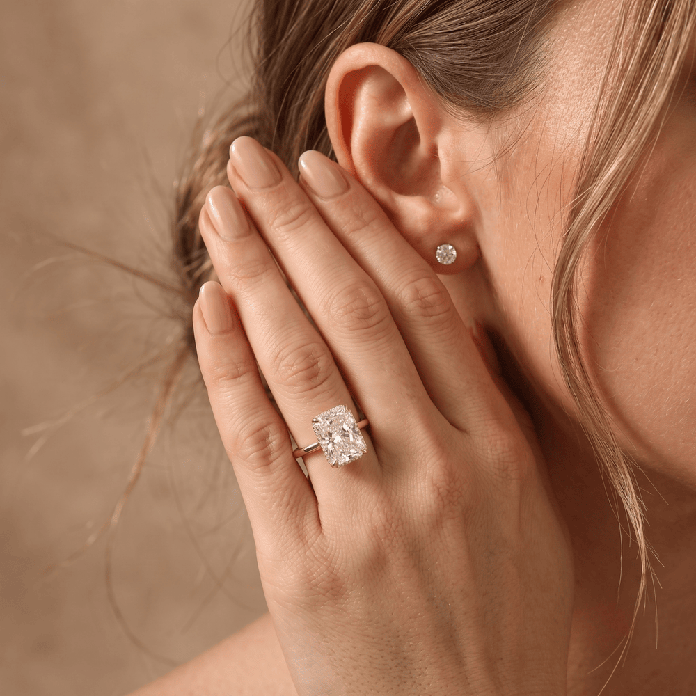 Radiant cut diamond hidden halo ring hand model wearing
