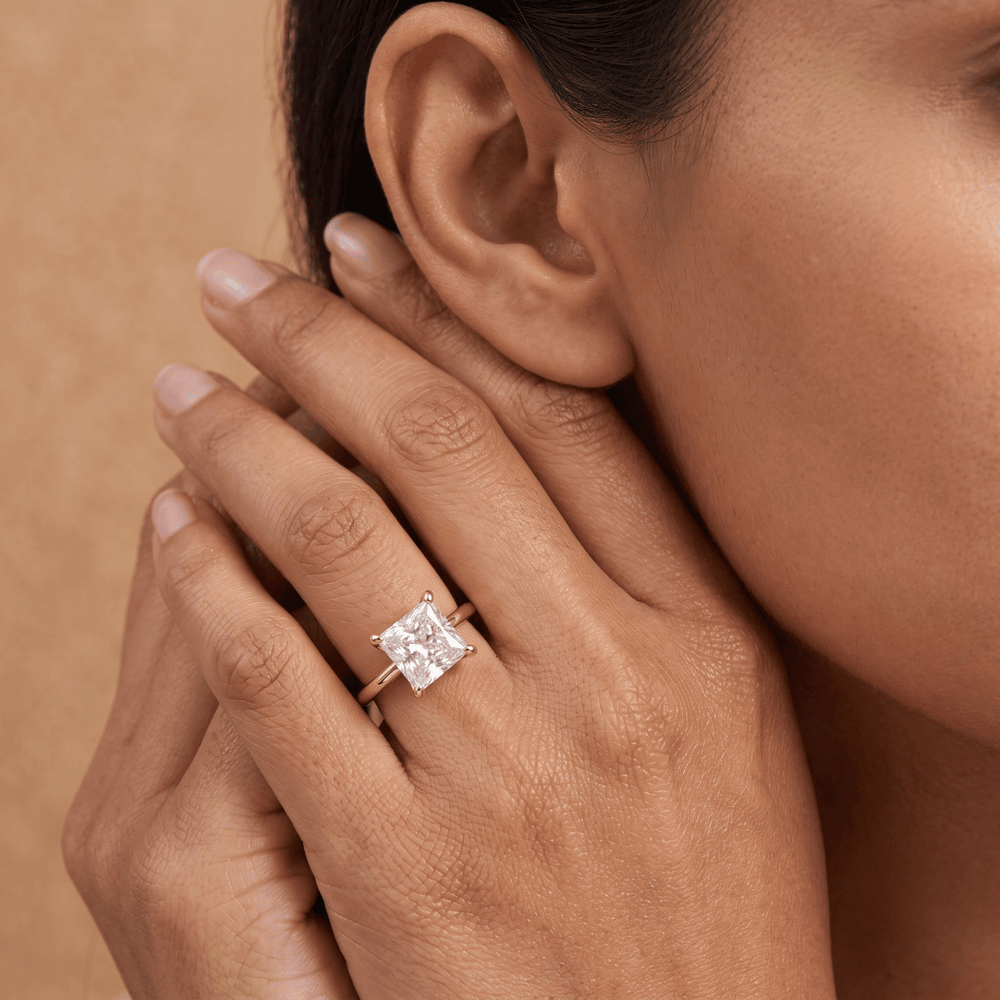 Princess cut diamond ring in art deco style