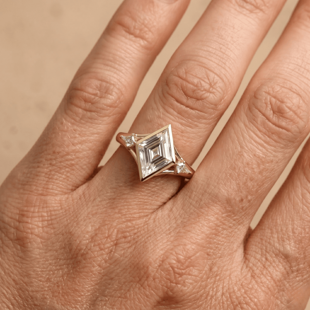 Three stone bezel diamond ring