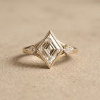 Three stone bezel engagement ring
