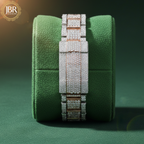 Luxury two-tone men’s wristwatch featuring a gold and silver stainless steel band, fully iced-out bezel and dial set with VVS moissanite stones, bold Roman numeral hour markers, and a high-polish finish for a flashy, high-end look.