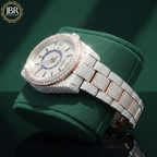Luxury two-tone men’s wristwatch featuring a gold and silver stainless steel band, fully iced-out bezel and dial set with VVS moissanite stones, bold Roman numeral hour markers, and a high-polish finish for a flashy, high-end look.