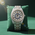 Luxury two-tone men’s wristwatch featuring a gold and silver stainless steel band, fully iced-out bezel and dial set with VVS moissanite stones, bold Roman numeral hour markers, and a high-polish finish for a flashy, high-end look.