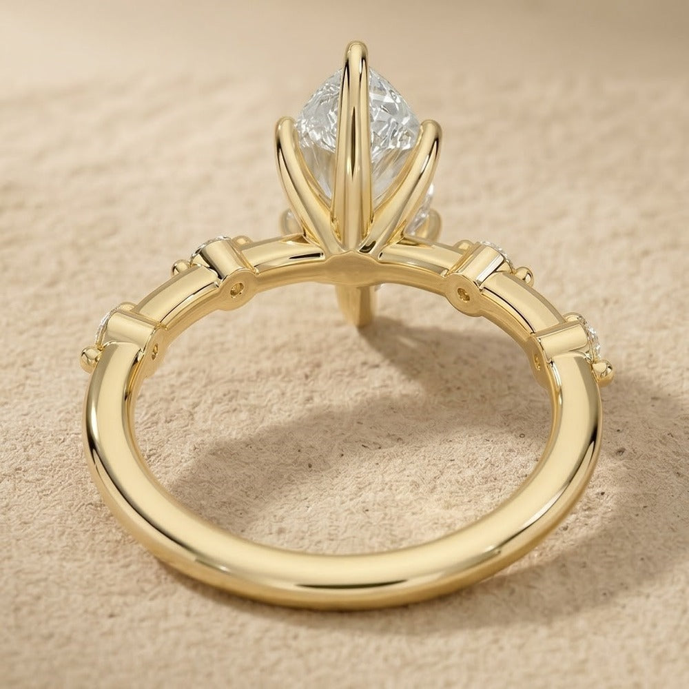1. Marquise moissanite ring with a delicate thin band