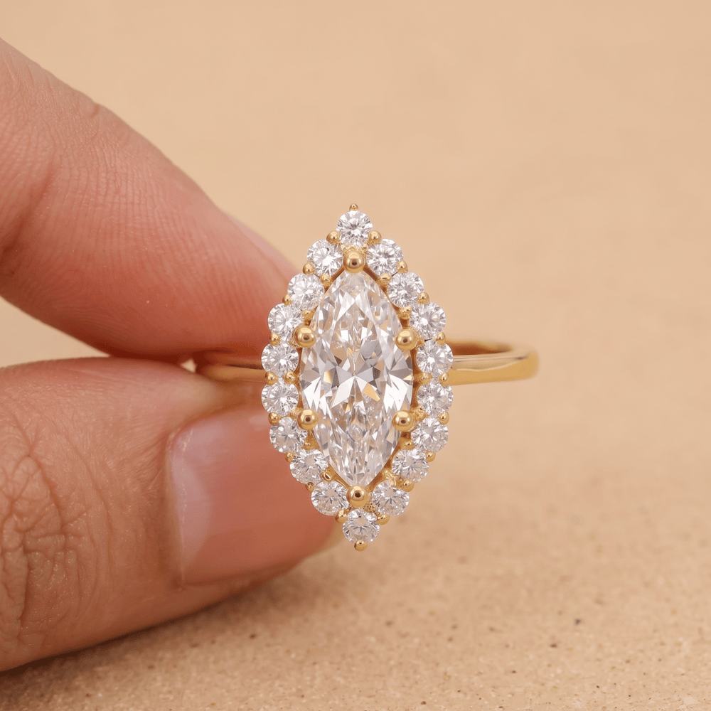 Marquise diamond ring shown on model's hand