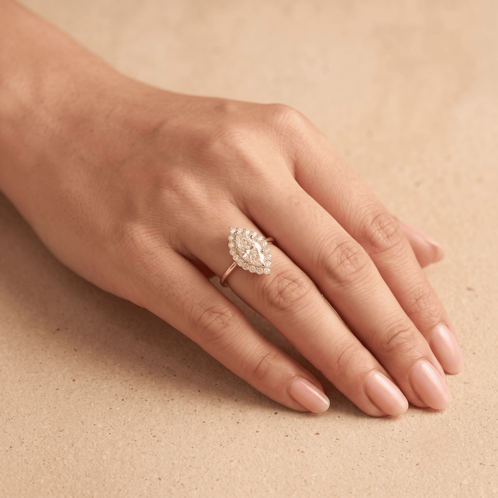 Marquise diamond ring shown on model's hand