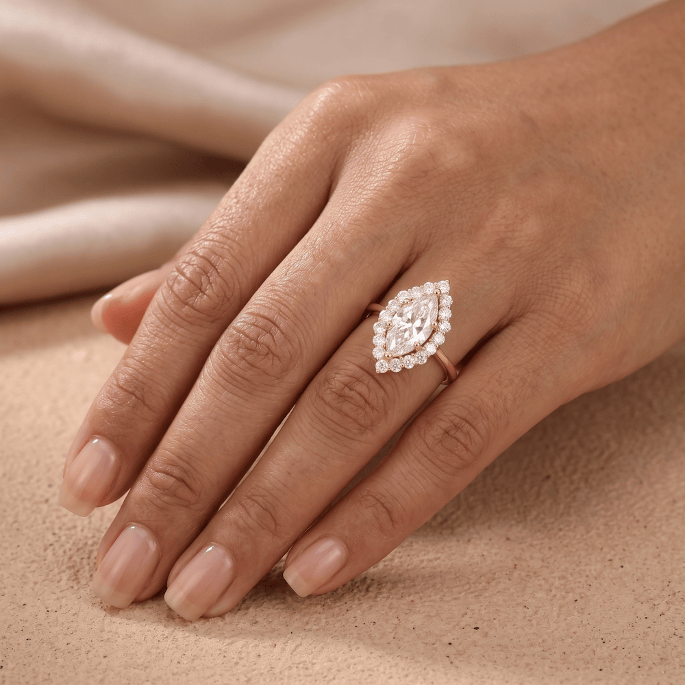 Marquise diamond ring shown on model's hand