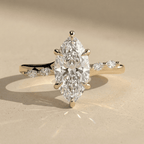 Marquise lab diamond engagement ring with hidden halo in yellow gold