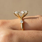 Delicate 14K gold promise ring with marquise diamond