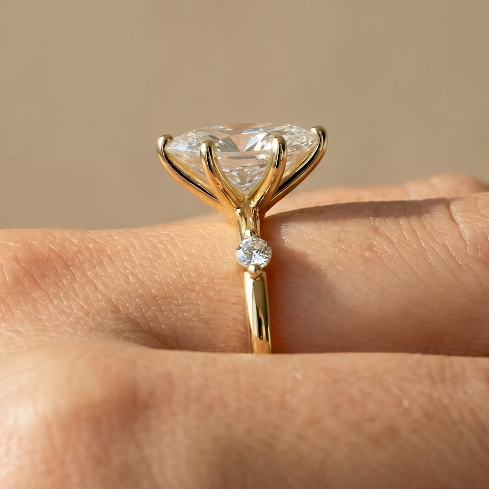 Delicate 14K gold promise ring with marquise diamond