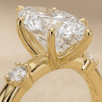 Close-up of marquise lab diamond ring in 14K gold