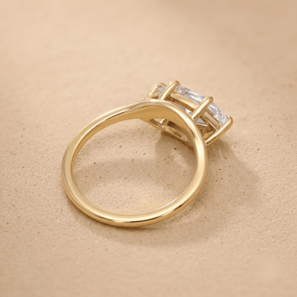 Curved band marquise engagement ring side angle