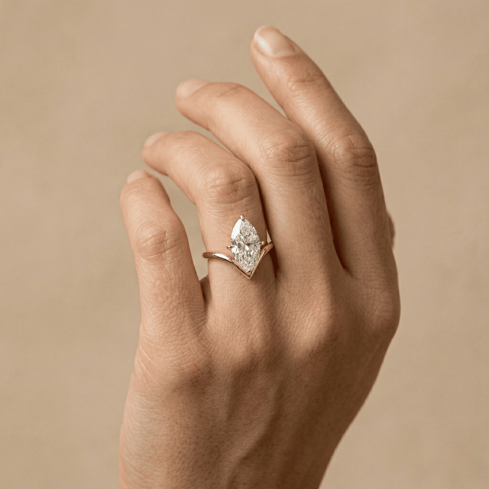 Solid gold curved marquise diamond engagement ring
