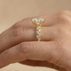 Marquise moissanite gold ring photographed from above