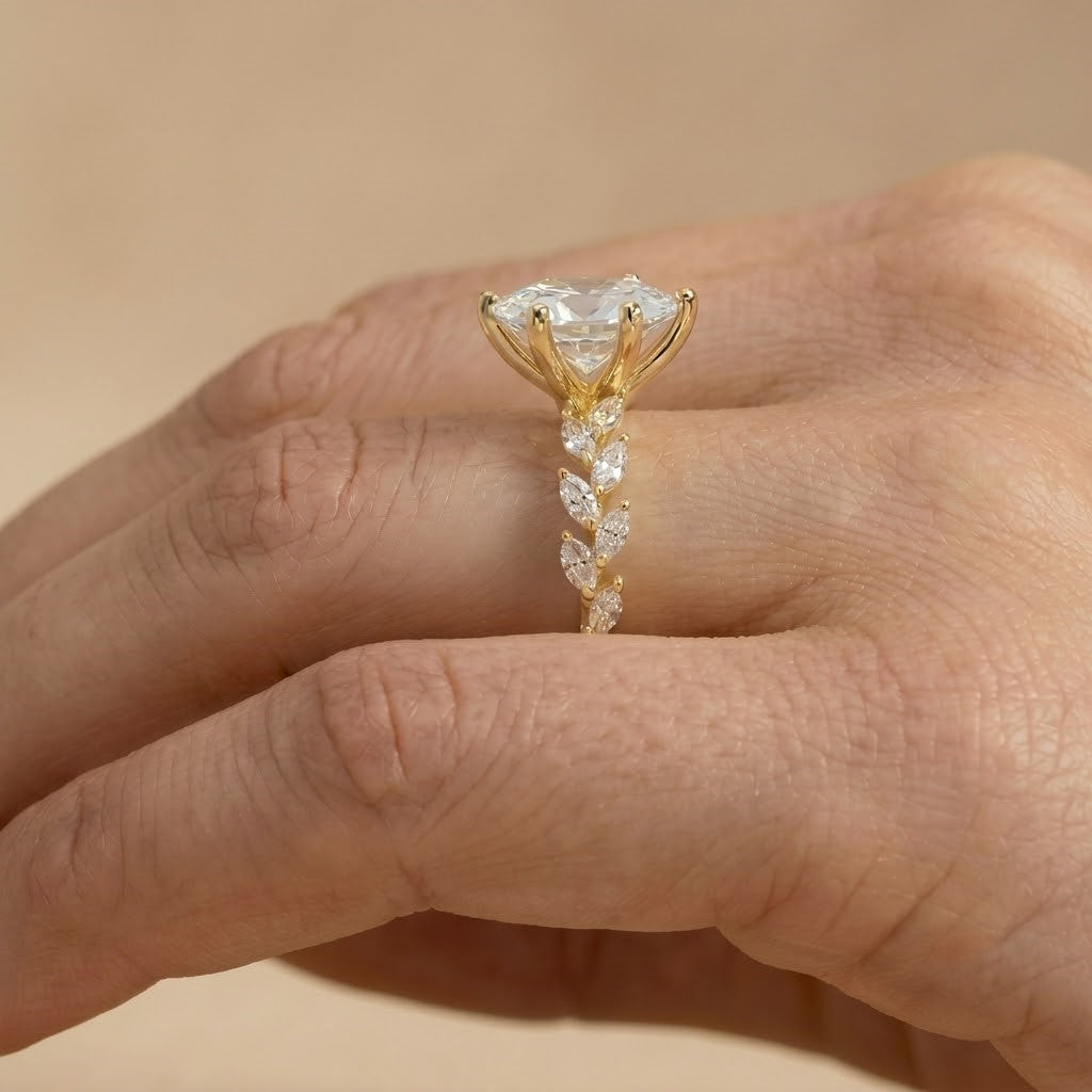 Marquise moissanite gold ring photographed from above