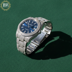 Men’s blue dial moissanite fully iced out watch with sparkling stones, bold luxury design, and polished metal strap for standout style.