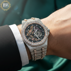 Men’s custom iced out skeleton watch fully flooded with real moissanite stones featuring automatic movement and transparent dial design