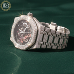 Men’s custom iced out skeleton watch fully flooded with real moissanite stones featuring automatic movement and transparent dial design