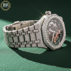 Men’s custom iced out skeleton watch fully flooded with real moissanite stones featuring automatic movement and transparent dial design