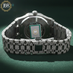 Men’s custom iced out skeleton watch fully flooded with real moissanite stones featuring automatic movement and transparent dial design