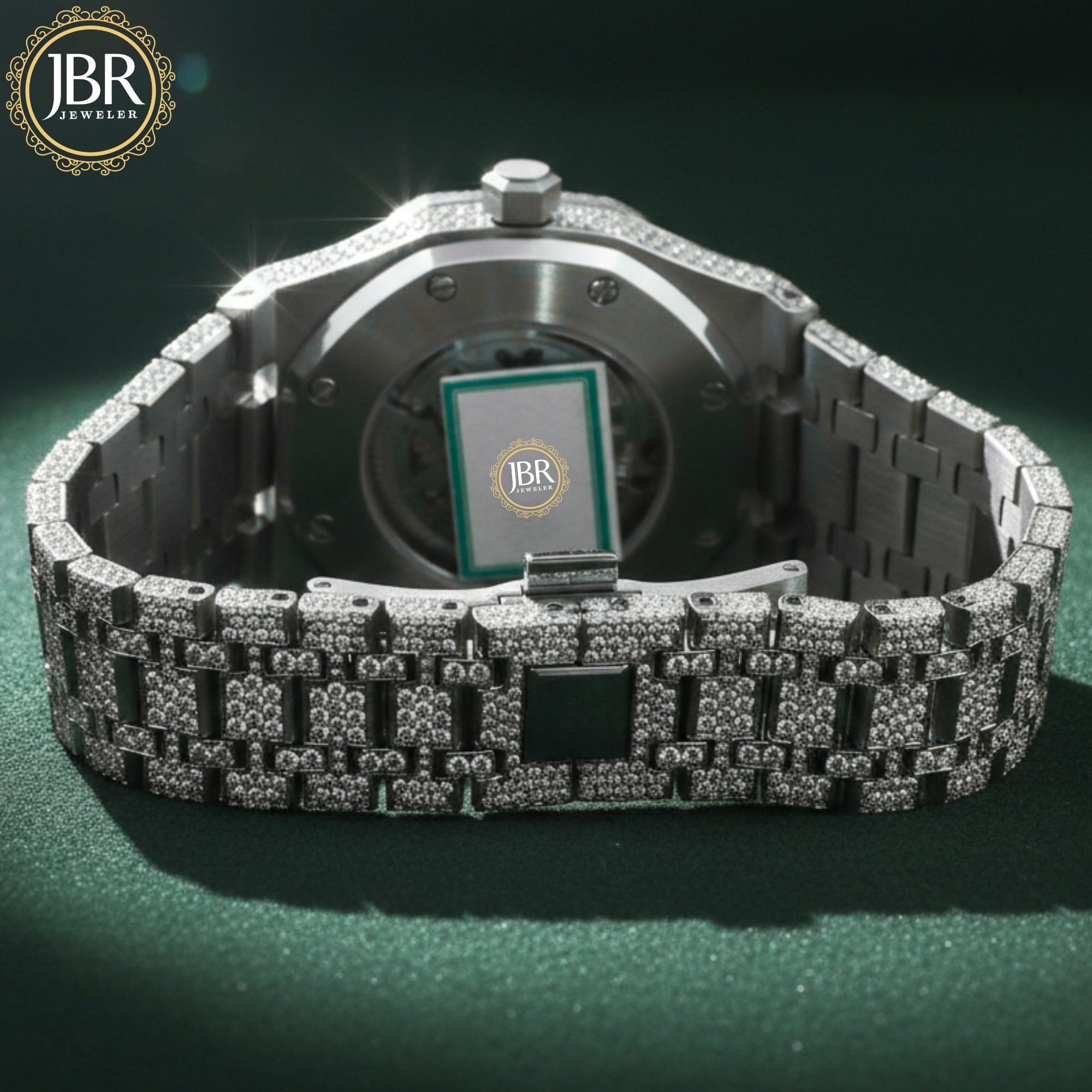 Men’s custom iced out skeleton watch fully flooded with real moissanite stones featuring automatic movement and transparent dial design