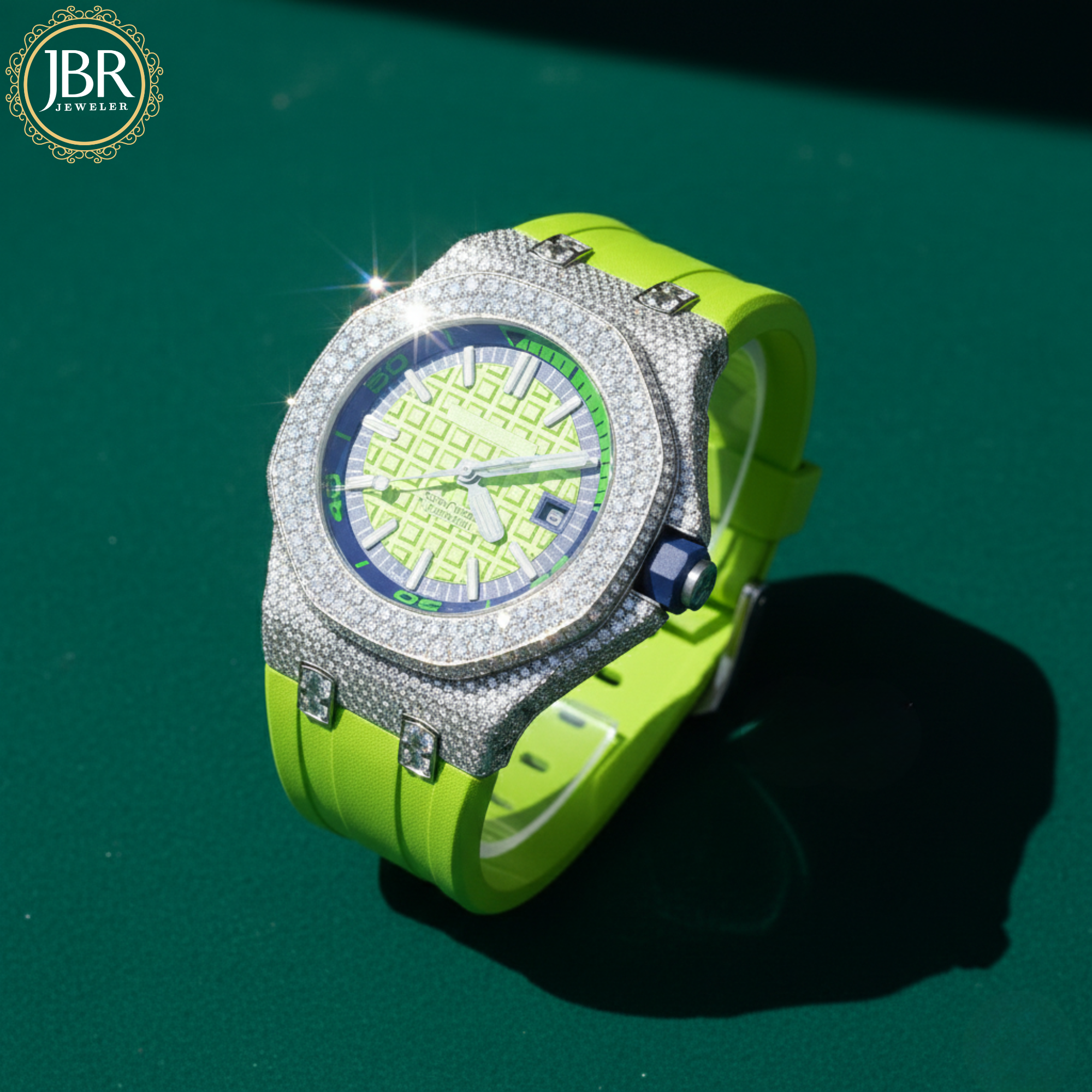 Luxury watch with a green strap and diamond-studded face on a dark green background, featuring JBR Jewellers 