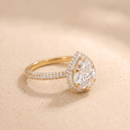 Pear cut moissanite halo ring side profile
