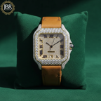 Mustard yellow leather belt round moissanite VVS iced out watch with sparkling stones, bold dial, and luxury hip hop style design.