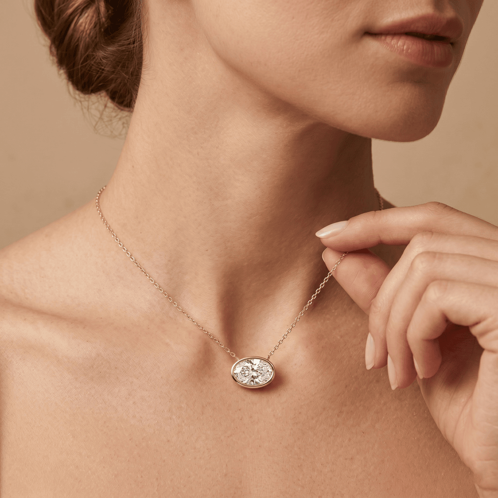 Oval Bezel Cut Solitaire Diamond Pendant Necklace in 14K Gold