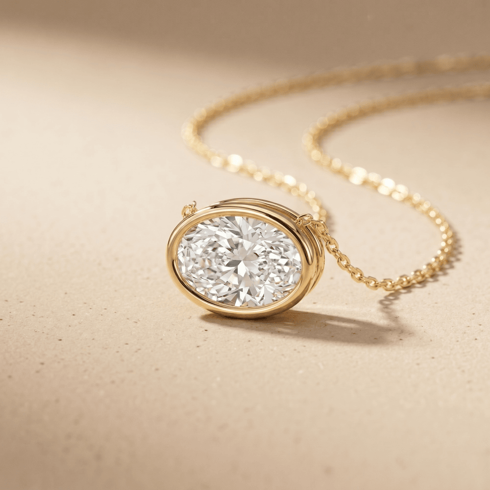 Oval Bezel Cut Solitaire Diamond Pendant Necklace in 14K Gold