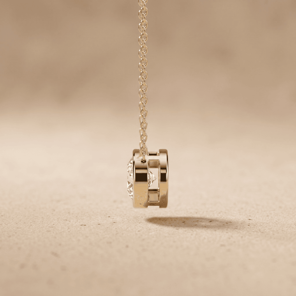 Oval Bezel Cut Solitaire Diamond Pendant Necklace in 14K Gold