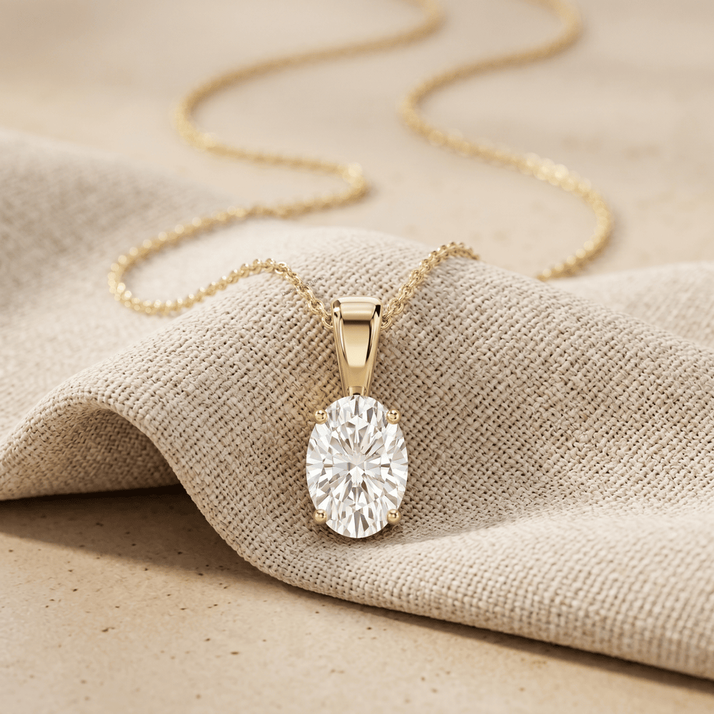 Oval Cut Diamond Solitaire Pendant Necklace in 14K Yellow Gold