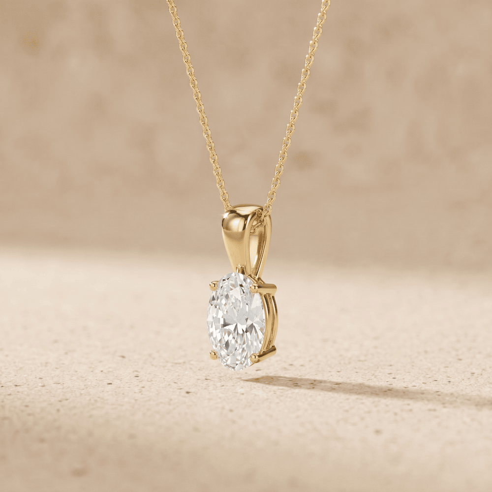 Oval Cut Diamond Solitaire Pendant Necklace in 14K Yellow Gold