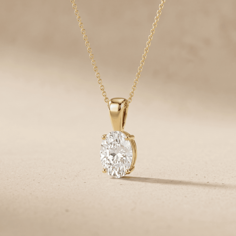 Oval Cut Diamond Solitaire Pendant Necklace in 14K Yellow Gold