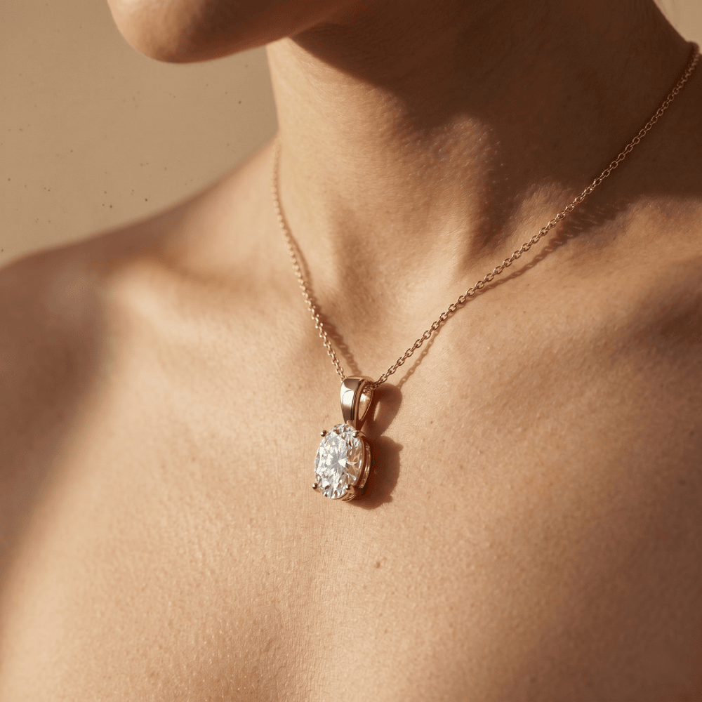 Oval Cut Diamond Solitaire Pendant Necklace in 14K Yellow Gold