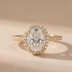 14K gold halo ring with oval center diamond
