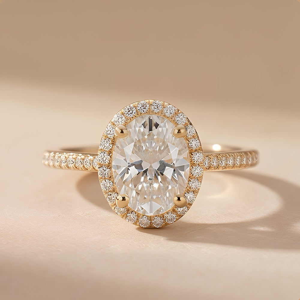 14K gold halo ring with oval center diamond
