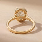 14K gold ring with sparkling diamond halo