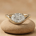 Oval east west lab diamond ring in 14K yellow gold wave band