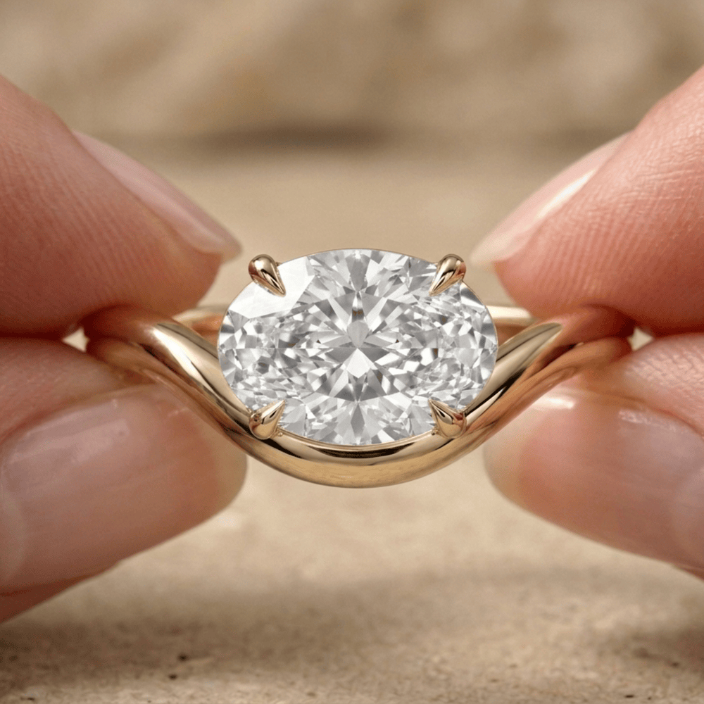 East west oval lab grown diamond engagement ring in yellow gold