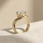 Side view of oval lab diamond ring with curved 14K gold band