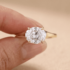 Oval lab diamond engagement ring on model's hand