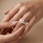 Classic oval three stone gold engagement ring