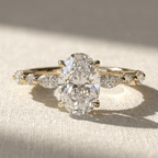 Dainty marquise diamond band with oval center stone