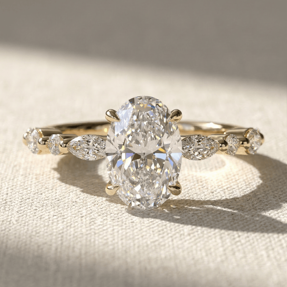 Dainty marquise diamond band with oval center stone