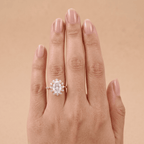 Gold halo ring with oval center stone