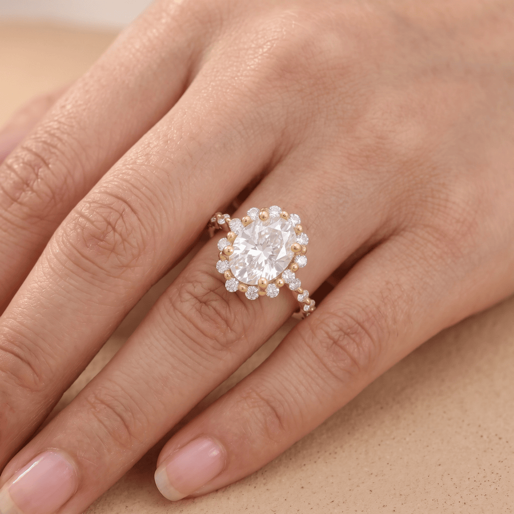 Shared prong oval ring lifestyle photo